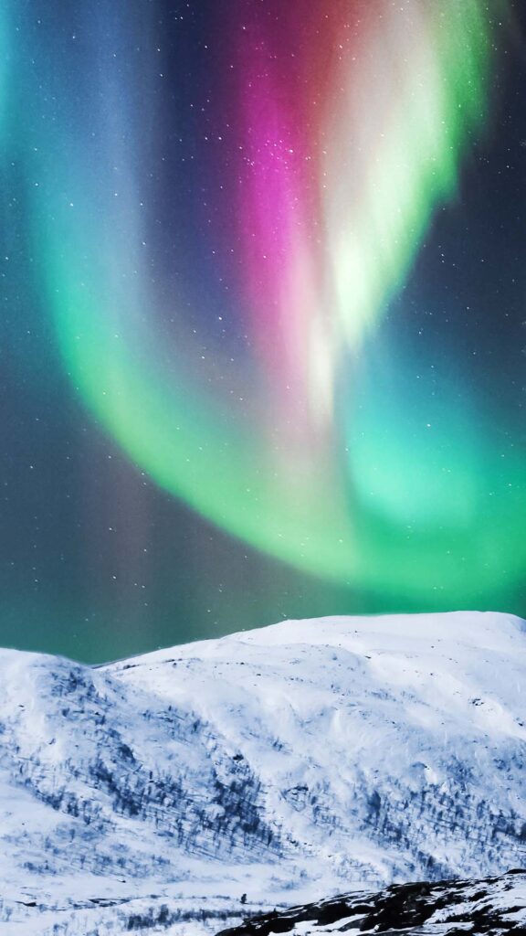 Northern lights in vivid colors above a polar landscape