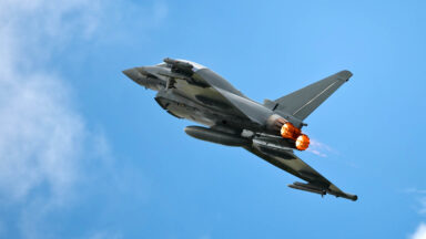 Image featuring a fighter jet using its afterburner